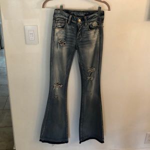 Distressed flare jeans